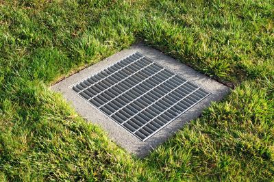 Filters debris to protect drainage systems.